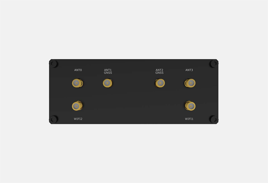 A black rectangular object with gold colored connectorsDescription automatically generated